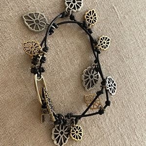 Lucky Brand leaf charm and leather cord bracelet